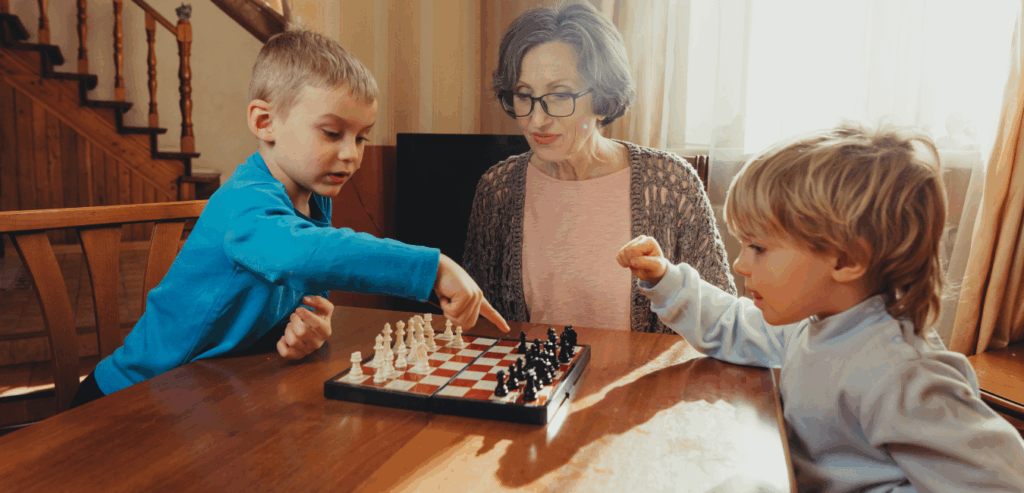 Family playing chess together during winter break.